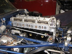 E-type engine back in position awaiting cam covers and inlet manifold
