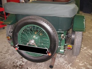 No more trailing wires, a newly fabricated number plate bracket and the spare wheel clamp has been straightened out to fit correctly