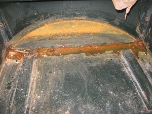 XK140 boot showing some corrosion